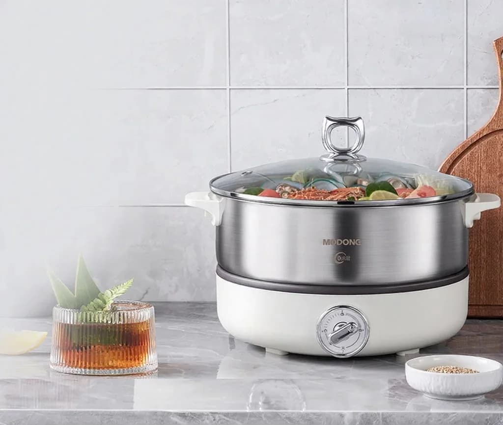 Delad elektrisk hot pot med innergryta i rostfritt stål 1500W
